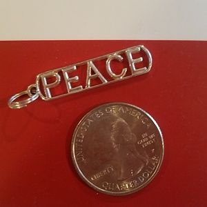 Sterling silver PEACE pendant